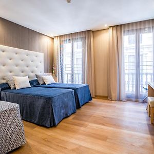 Kamer met een Queen Size Bed